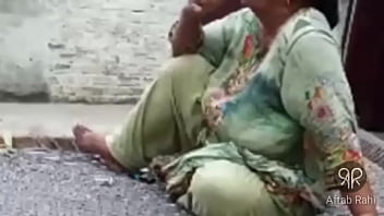 Sizzling Desi Auntie Puffing On A Cigarette