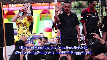 Two Stunning Singers Unleash A Wild, Erotic Dance On Stage, Surrounded By A Crowd Of Lustful Men